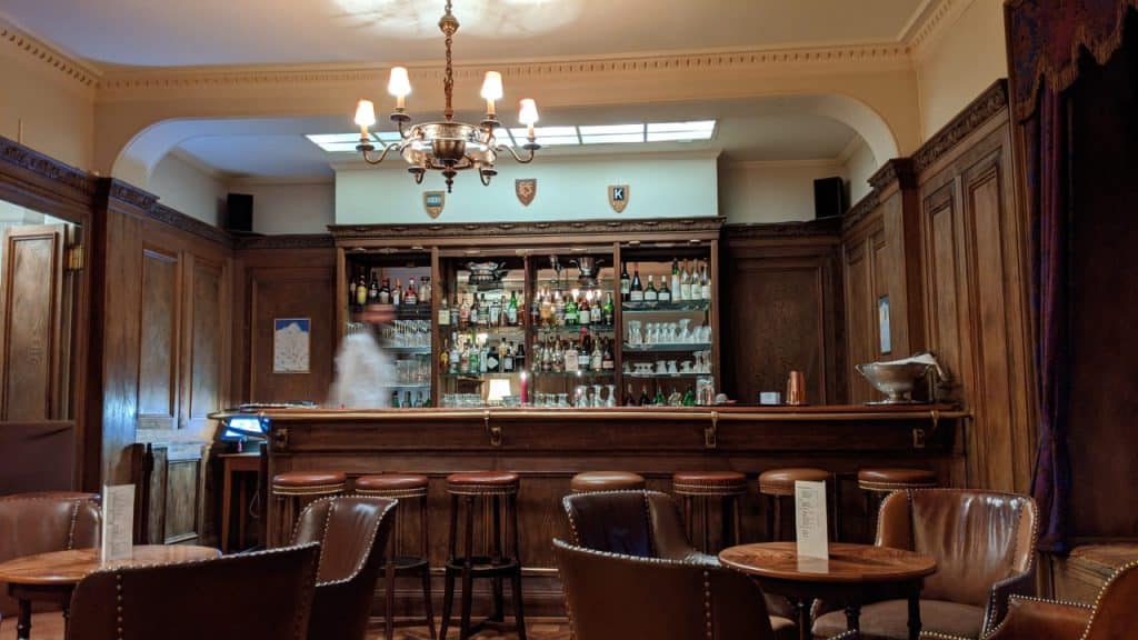 Bellevue des Alpes historic bar with bartender
