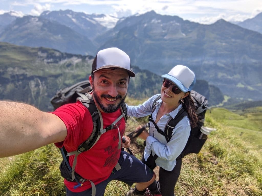 Solène (on the right) and Matthias (on the left) hiking Via Alpina in the Swiss Alps