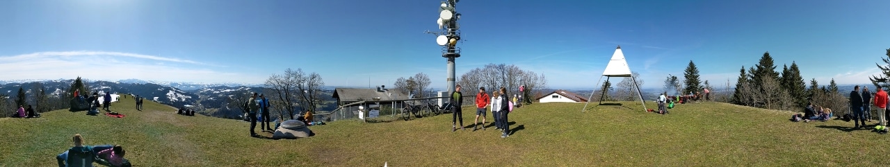 360° view from mount Hörnli. People resting and having a picnic.