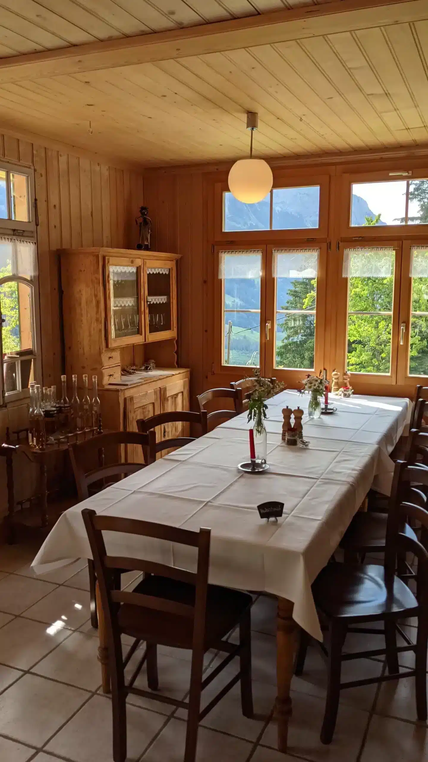 Table with a view at Hotel Waldrand Pochtenalp