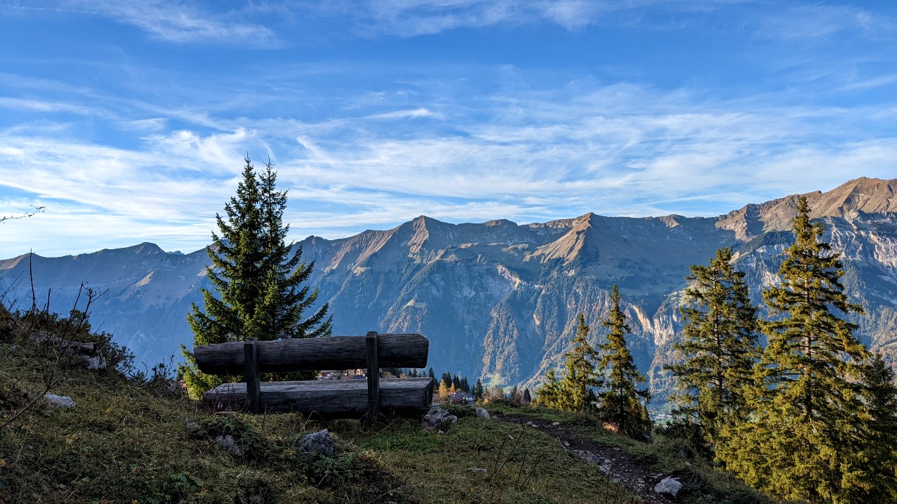 A bench with a view on the Schnitzlerweg from Axalp to Hinterburgseeli