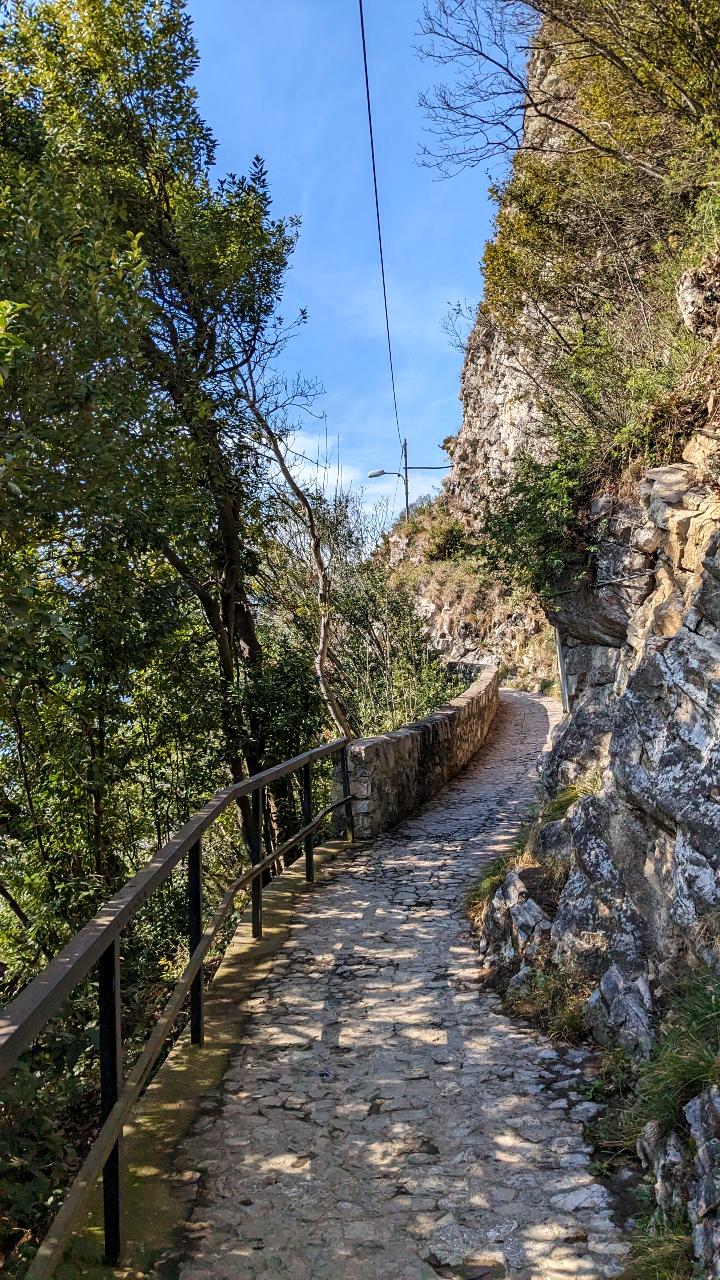 The Sentiero dell'olivo (Olive Trail) leads partially on a cobblestone path